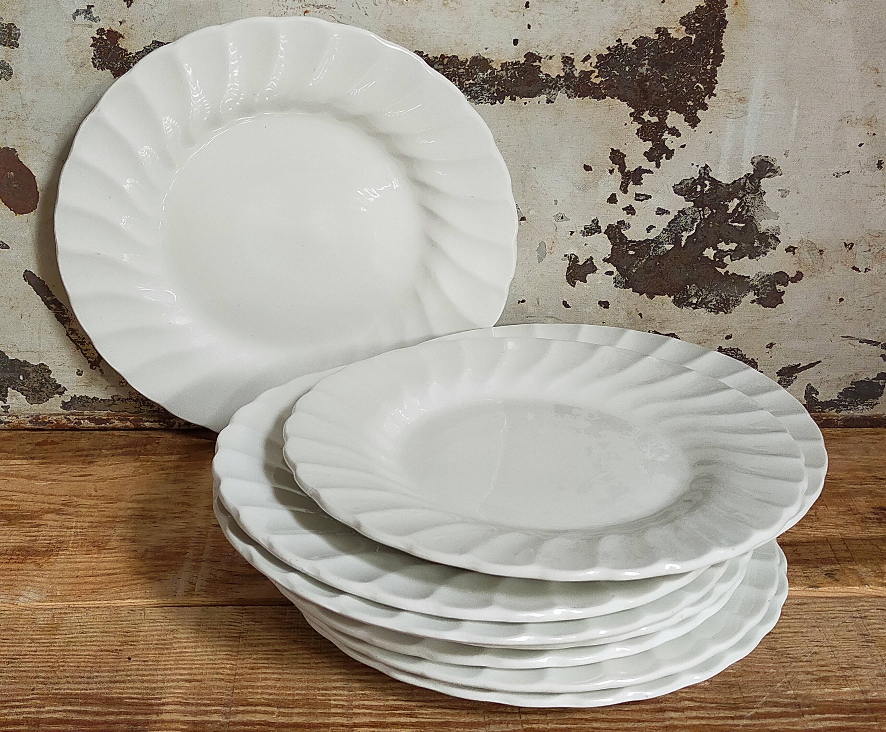 Nine fine English porcelain sweet plates