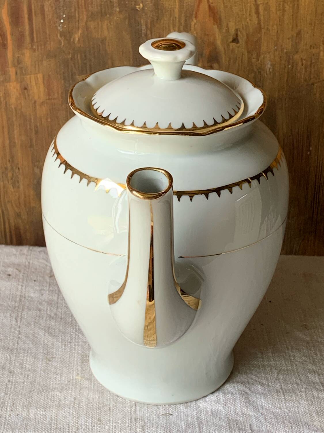 Antique porcelain jug with Limoges enamel