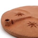 Round ceramic wall mask inspired by Africa, 1980s.