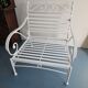 Robust wrought iron armchair