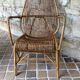 Rattan armchair and his feet rest