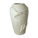 Thick white porcelain vase with relief decoration of a flying duck.
