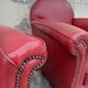 Paire de fauteuils club en simili cuir 1950