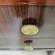 Art Deco executive desk in exotic wood, glass, and brass.