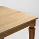 Vintage solid oak table with antique legs.