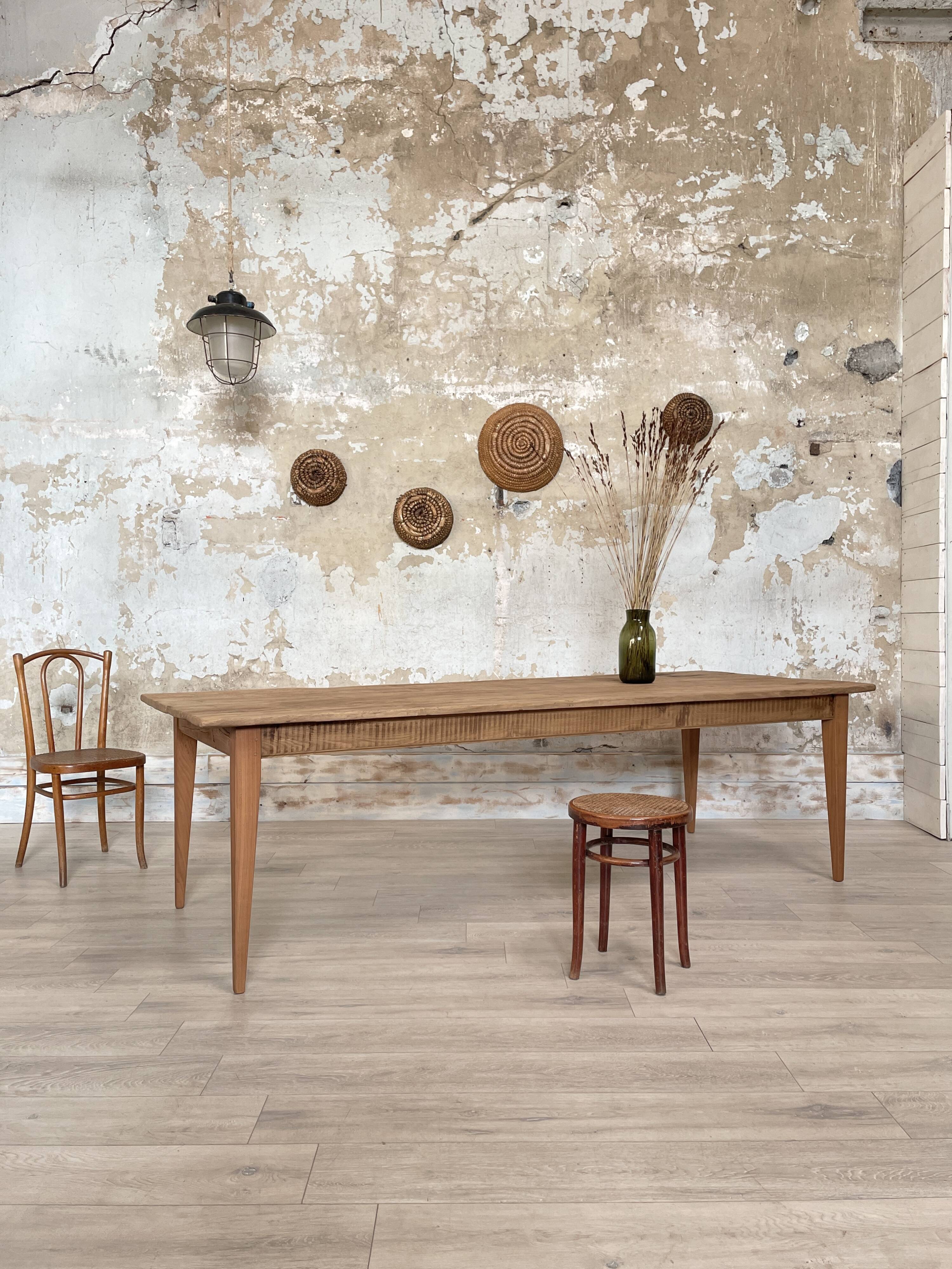 Vintage farm table with spindle legs.