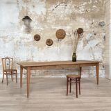 Vintage farm table with spindle legs.