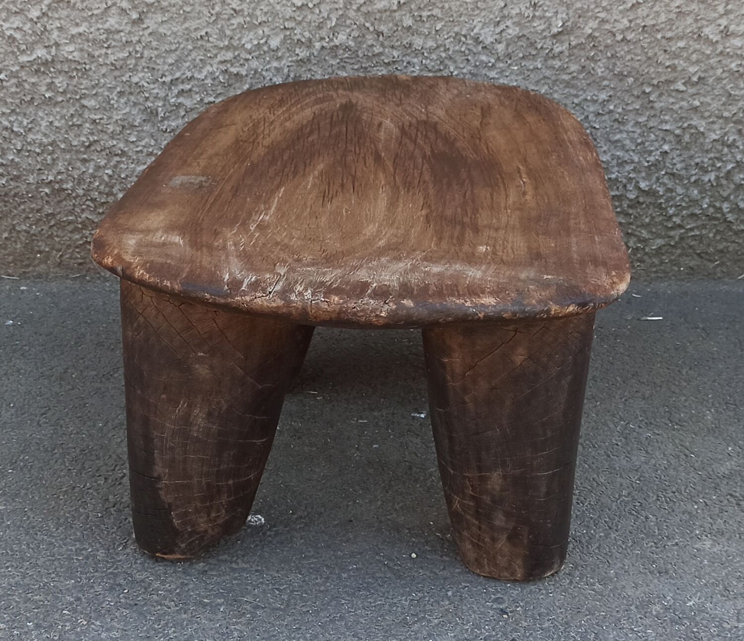 Antique wooden stool. Senufo African art from Côte d'Ivoire.