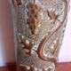 Shell casing vase carved into the trenches
