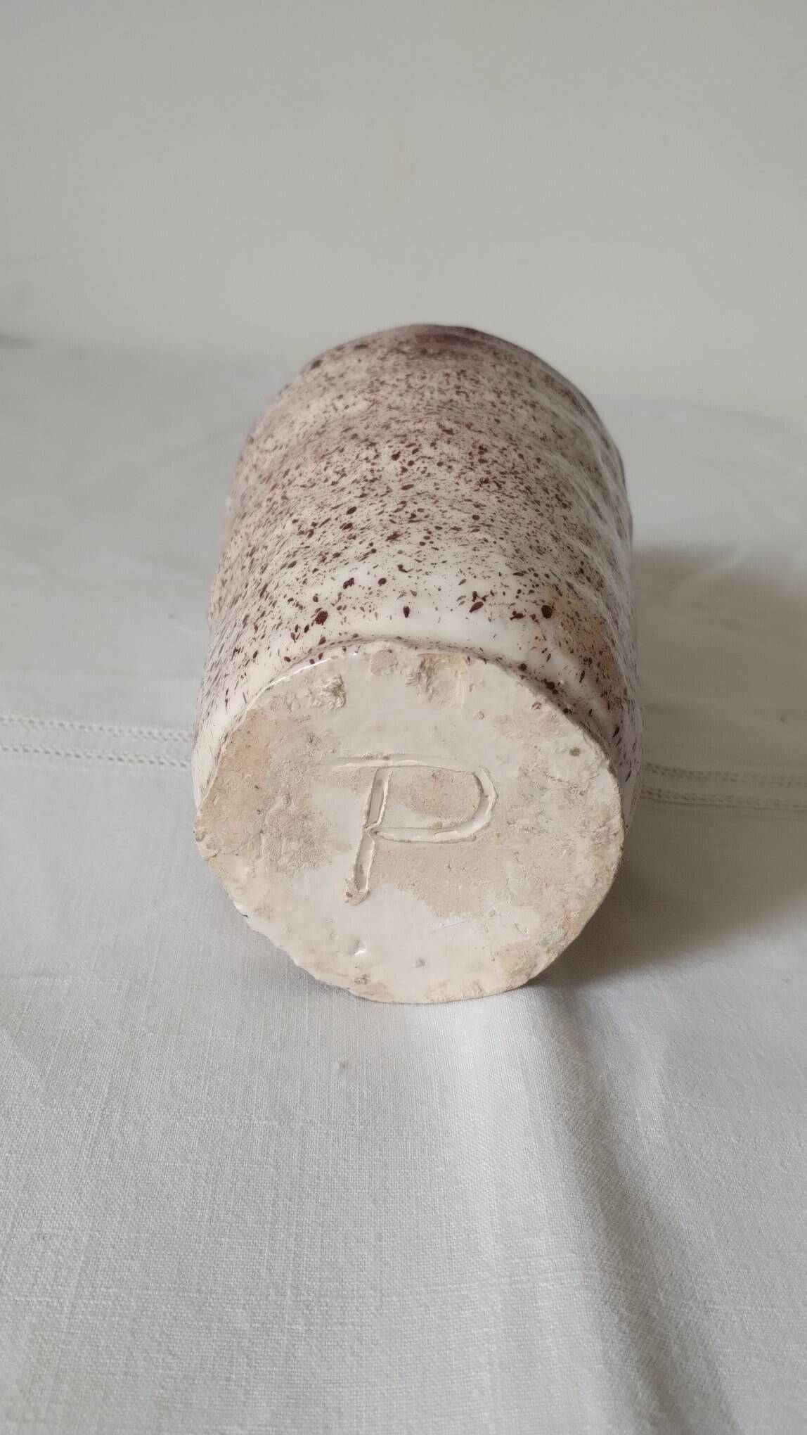 White ceramic vase with brown speckles