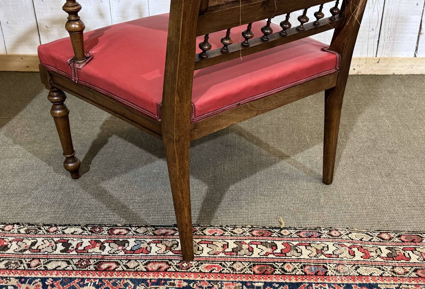 Breton armchair and its footrest from the 1930s.