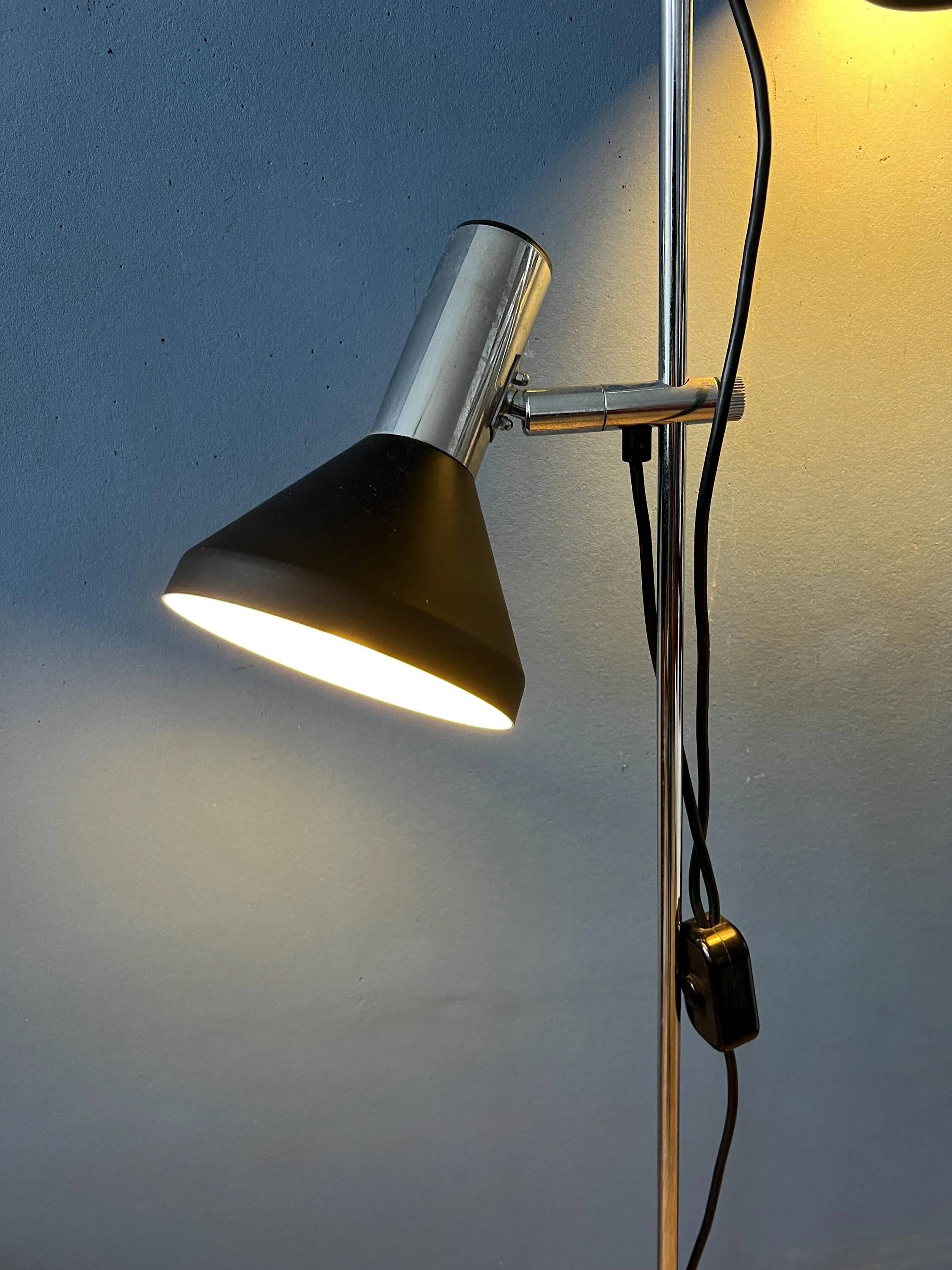 Mid-century black vintage floor lamp with two aluminium spots.