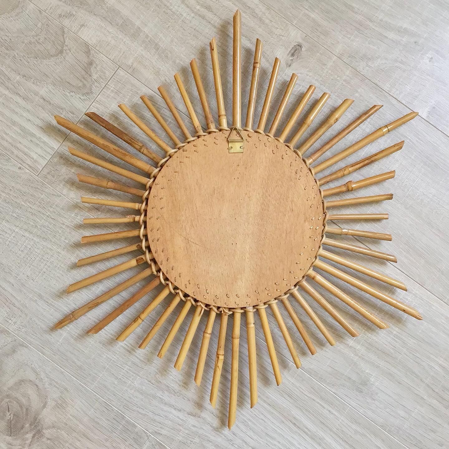 Vintage rattan sun mirror