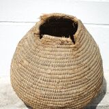 Old basket, burgundy straw and bramble, woven basket, interior decoration, pantry, flowerpot