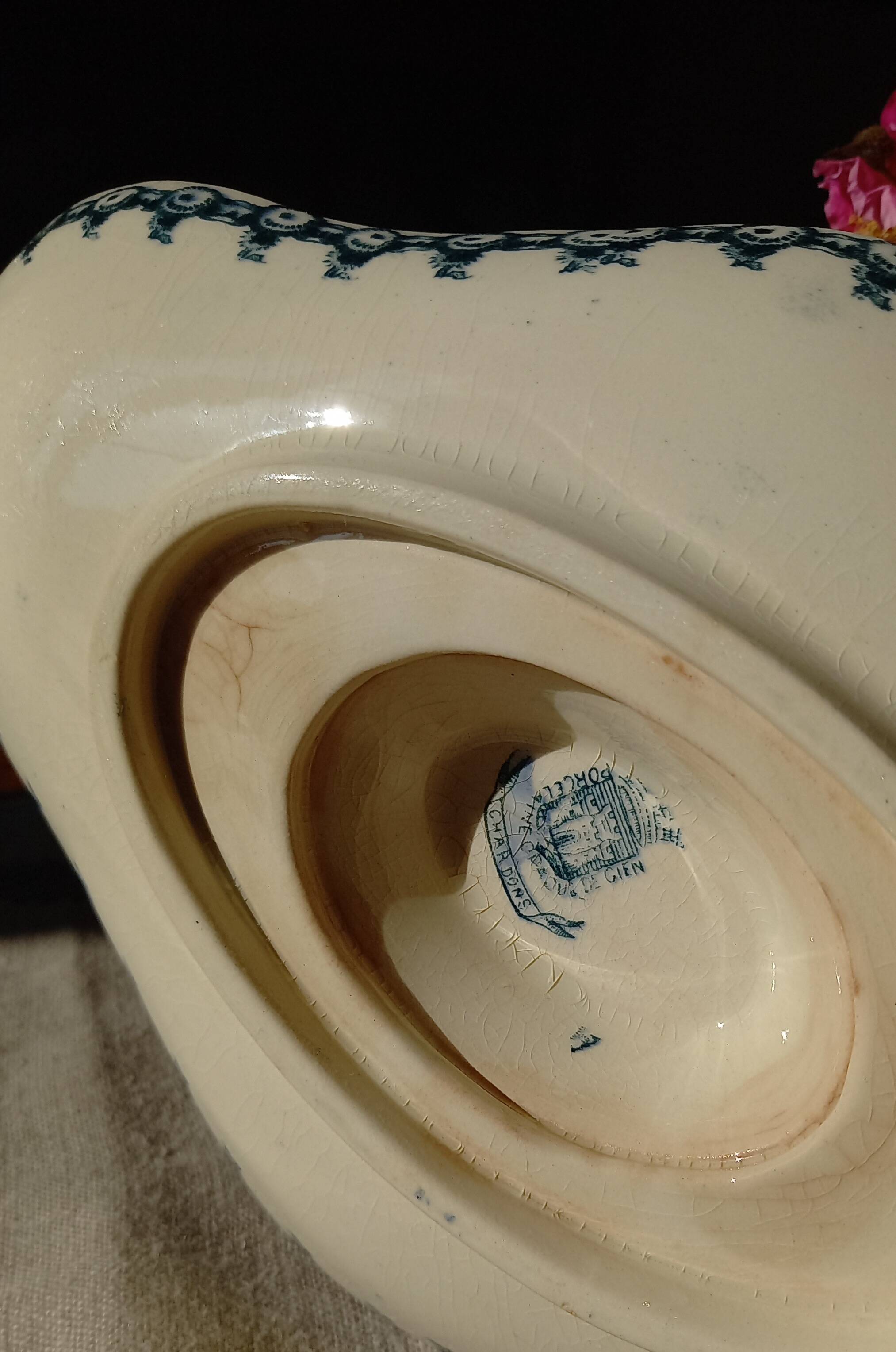 Old gravy boat on frame in terre de fer earthenware by gien, “chardons” model in blue-green