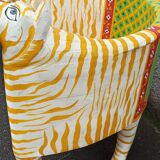Paire de fauteuils en bois apparence "tigre"
