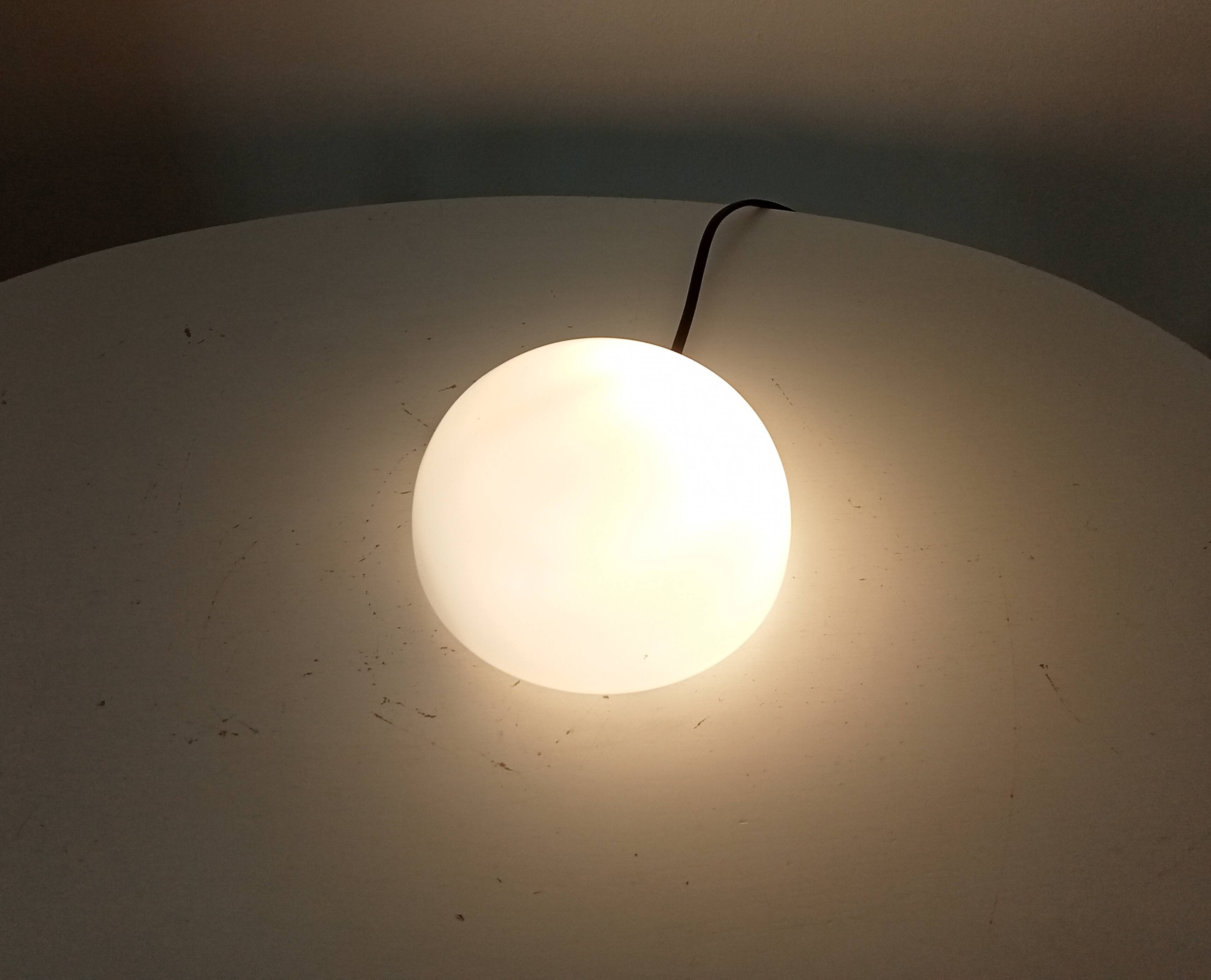 Vintage opaline wall light from the 1960s.