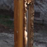Wooden mirror decorated with gold from the 1920s