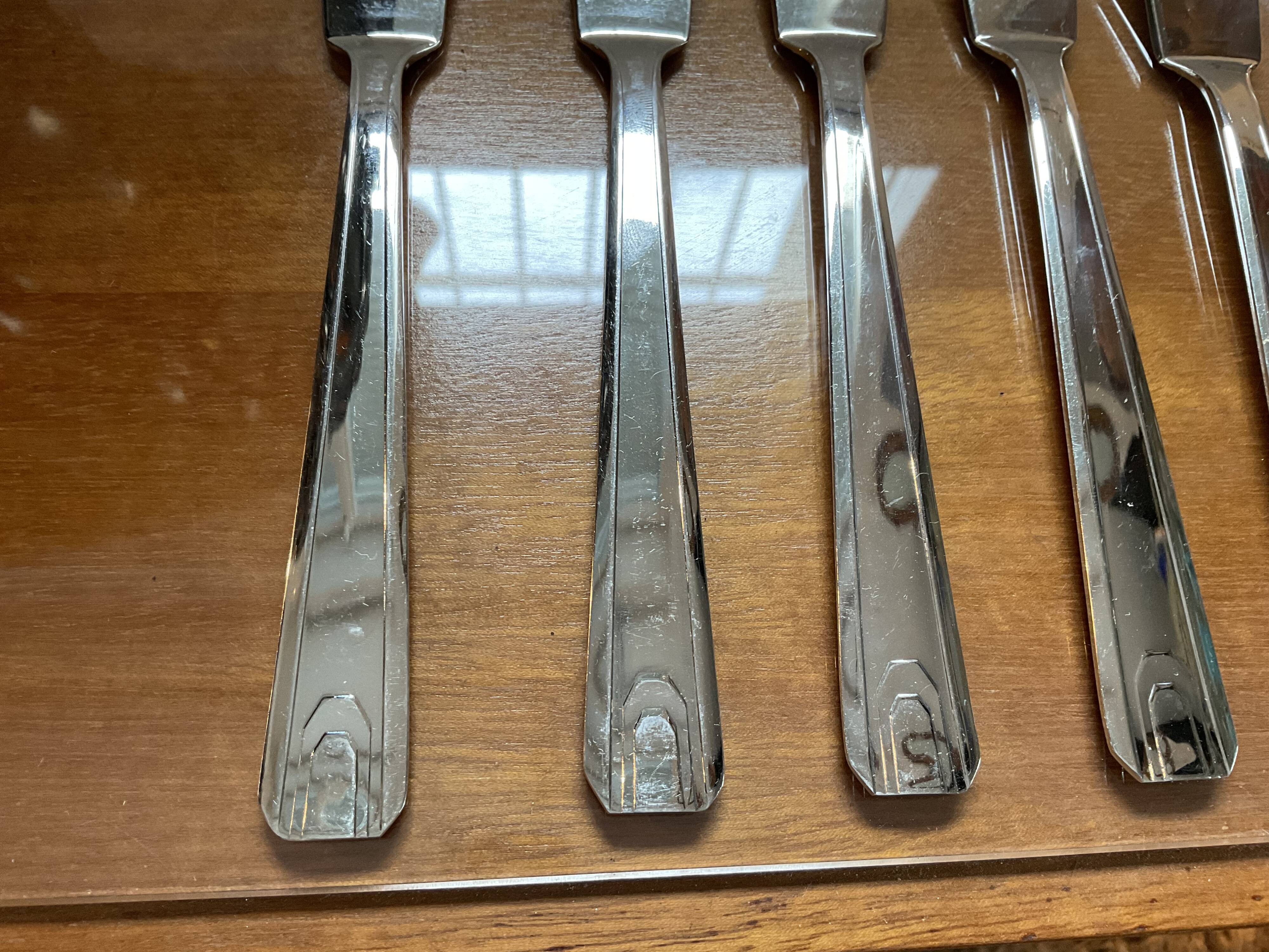 Stainless fish cutlery, 12 knives and 12 forks