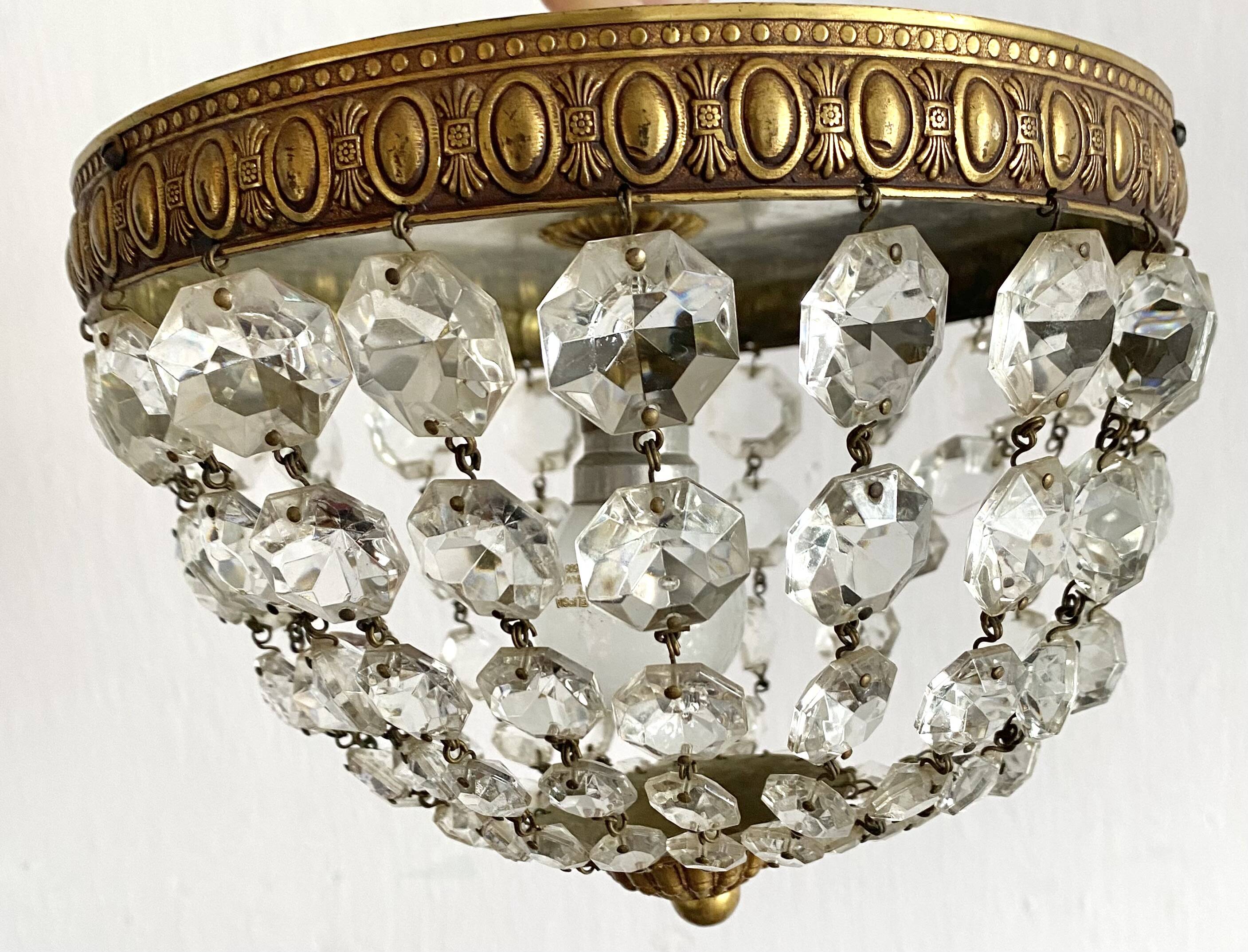 Old ceiling light with tassels and brass