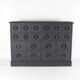Blackened wooden chest of drawers