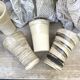 High ceramic cups made of mixed clay.