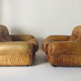 Pair of brown leather armchairs