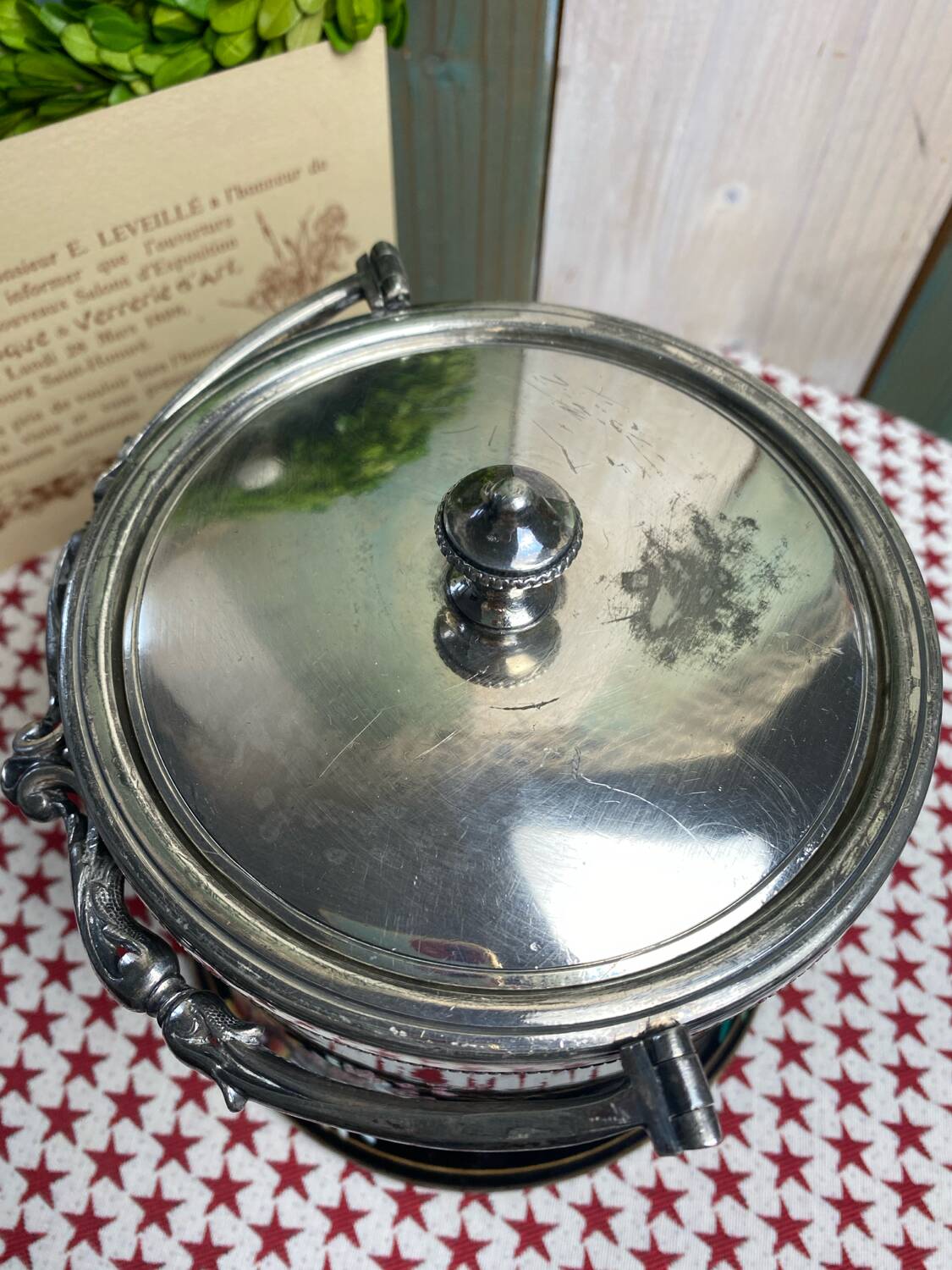 English porcelain and silver-plated metal cake tin