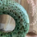 Handmade terracotta donut vase in light green terracotta