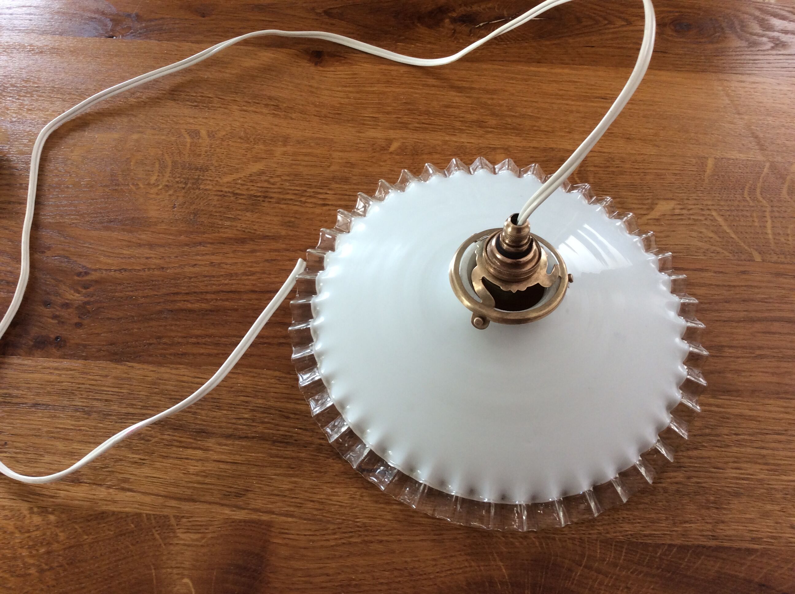 Old hanging lamp in dented opaline