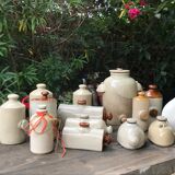 Old vinaigrier in sandstone vintage pot