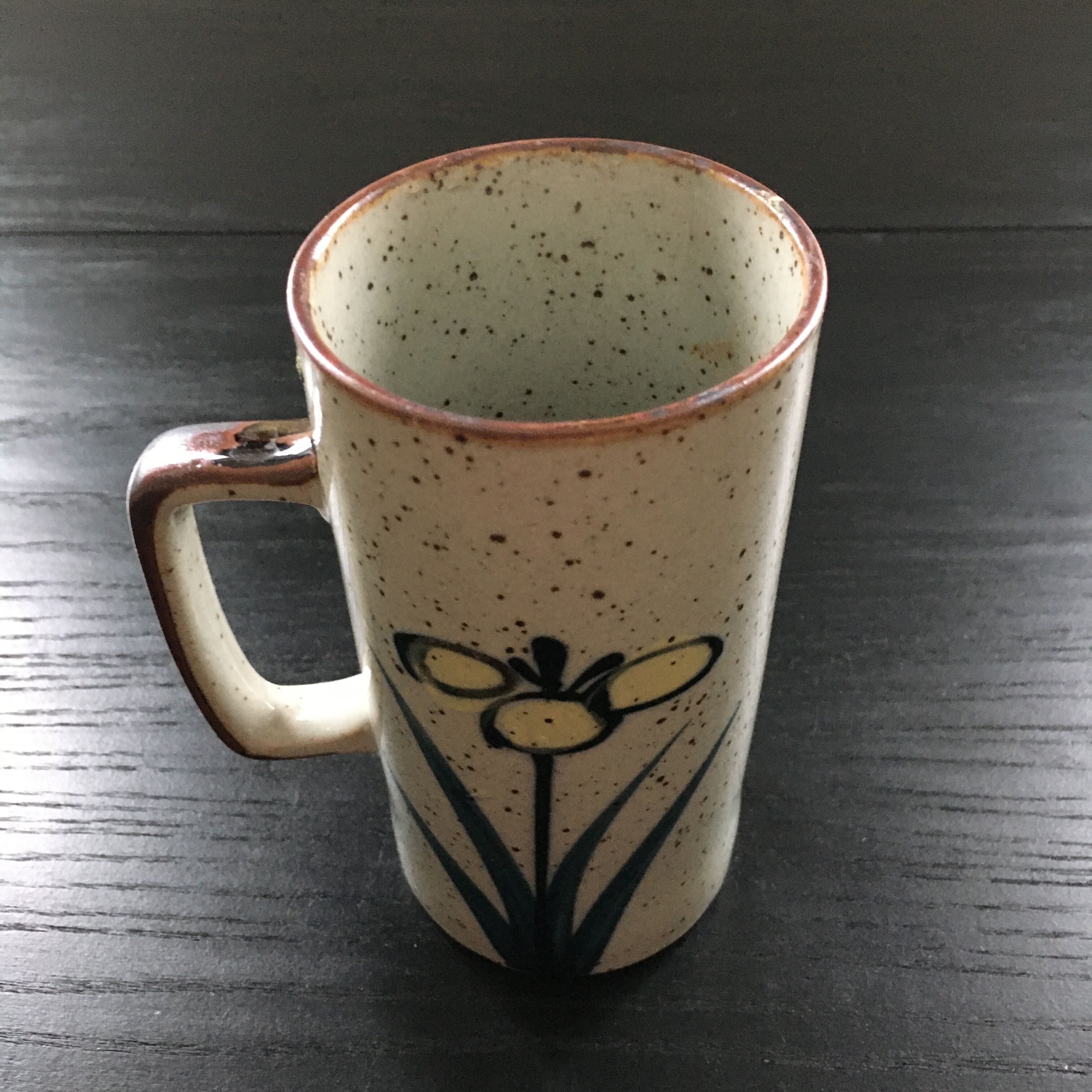 Stoneware mug with floral decoration