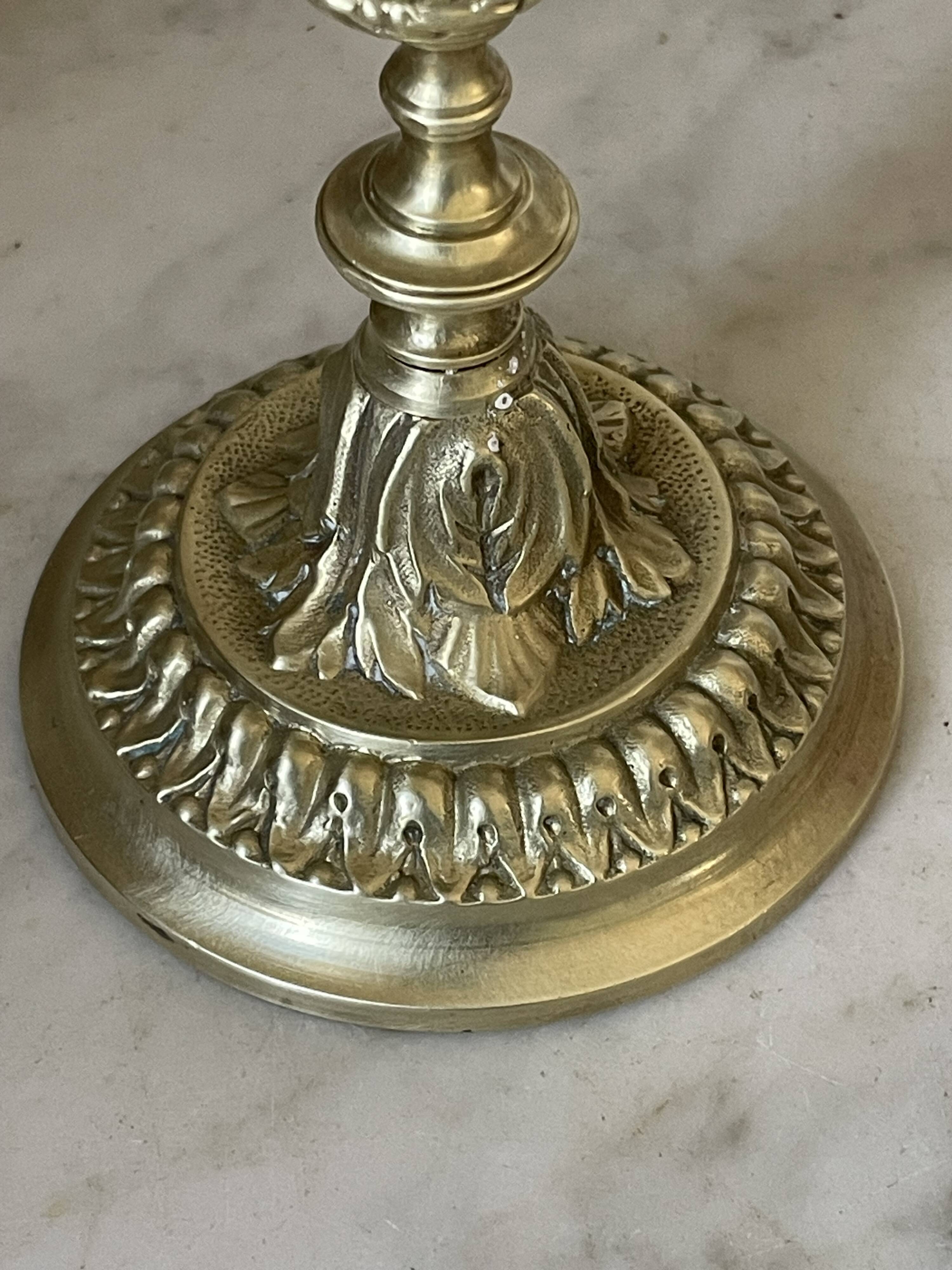 Pair of gilt bronze ram's head candlesticks, Louis XVI style, 19th century.