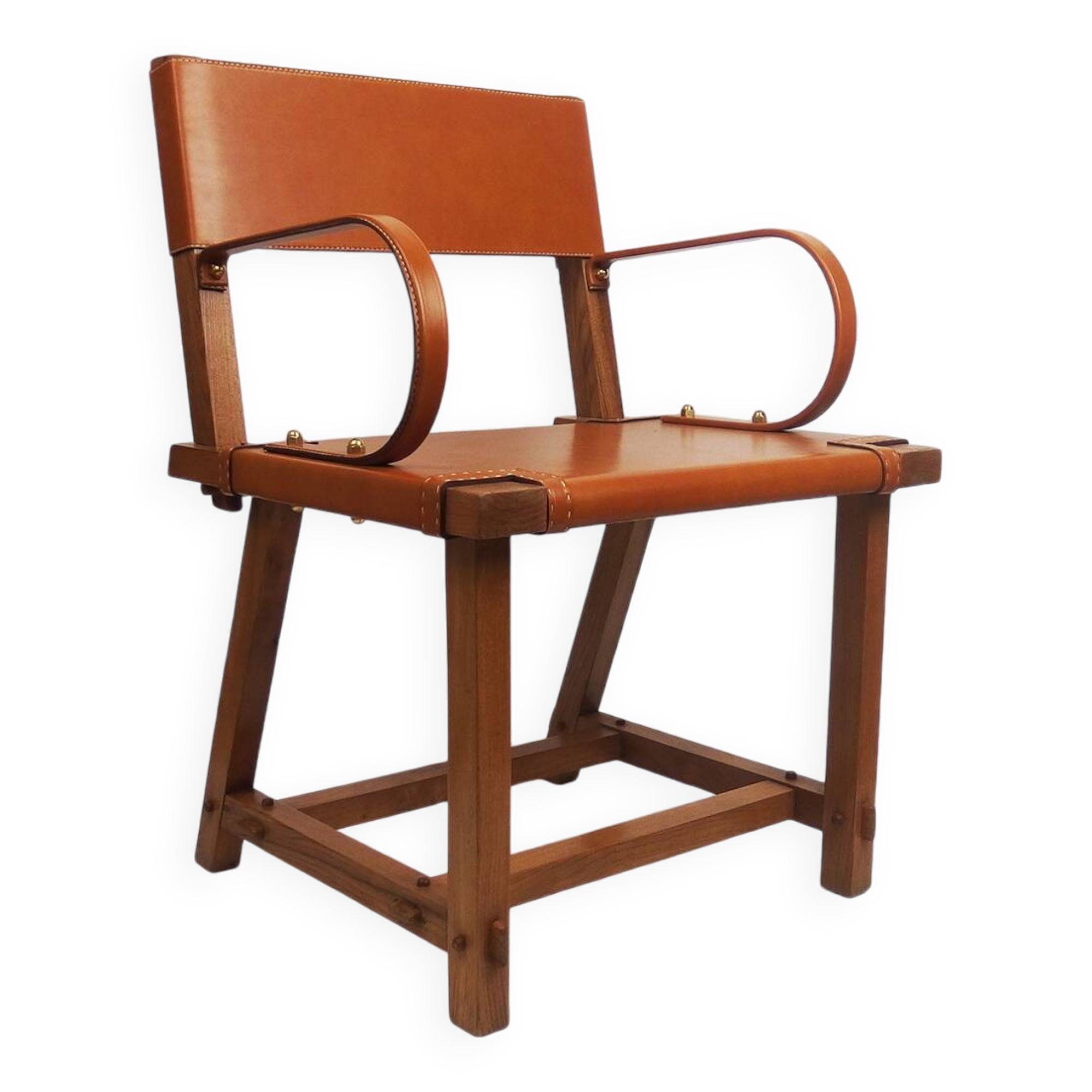 Leather armchair by Jacques Adnet