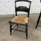 Hitchcock chairs in black wood and straw 1900s