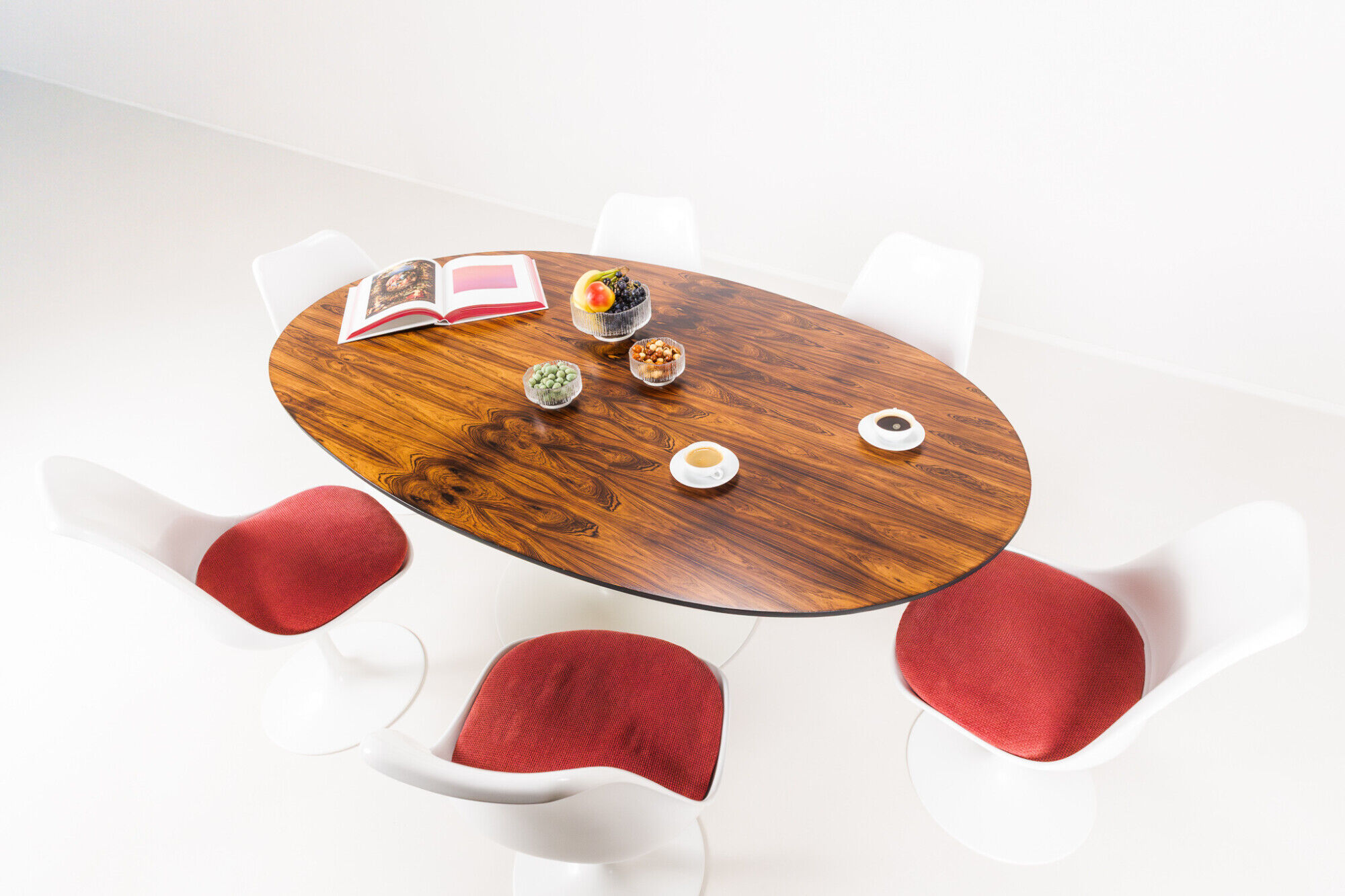 Oval dining table in rosewood by Maurice Burke for Arkana, England, 1960s