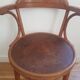 Wooden bistro chair with armrests