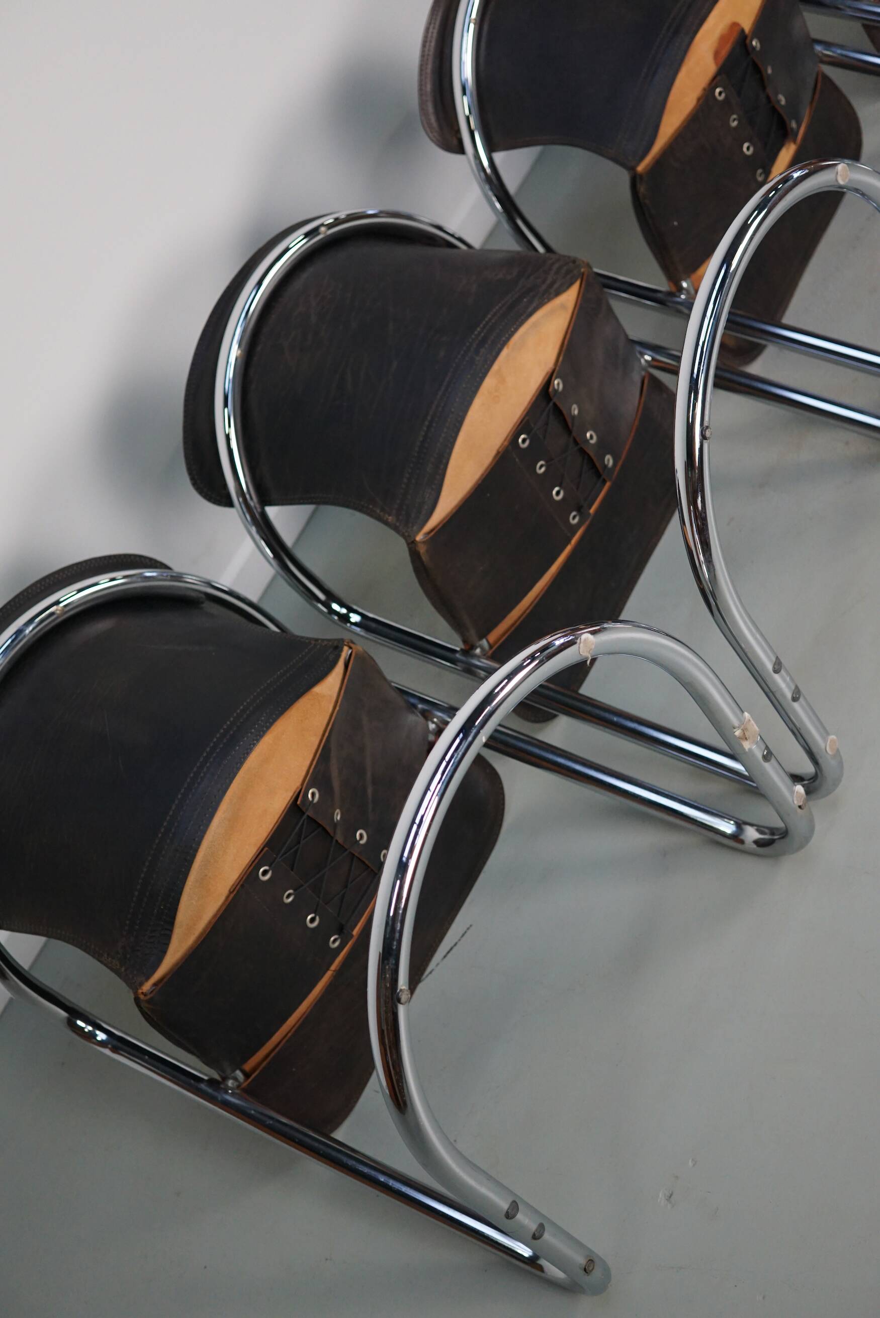 Set of four brown leather dining chairs, Willy Rizzo, 1970