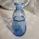 Small blown blue glass bottle