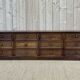 Long low oak countertop with 12 drawers - early XXth