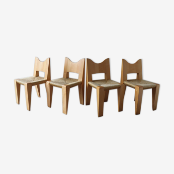 Série de 4 chaises vintage en bois massif et paille 1960