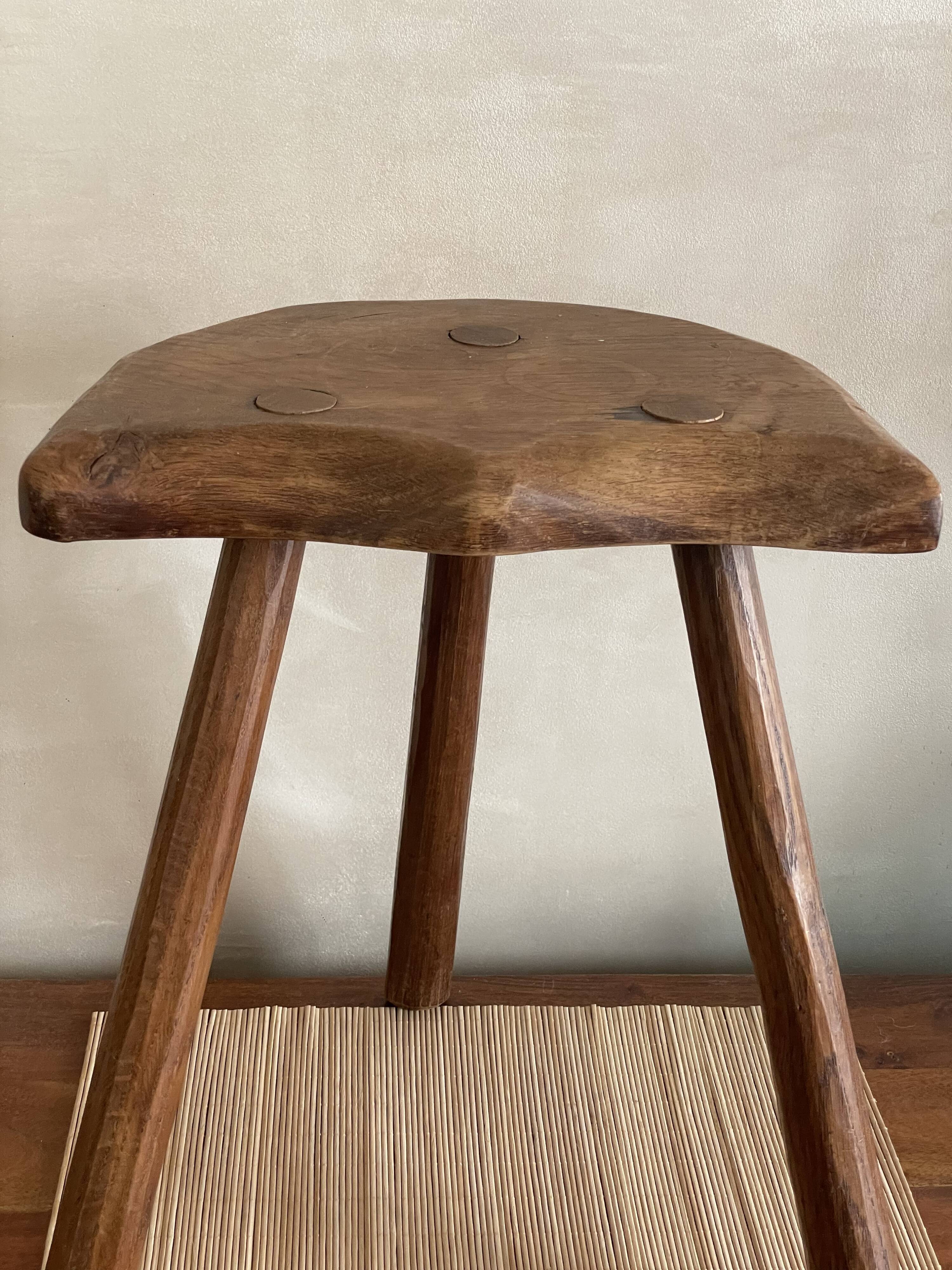 Wooden tripod stool