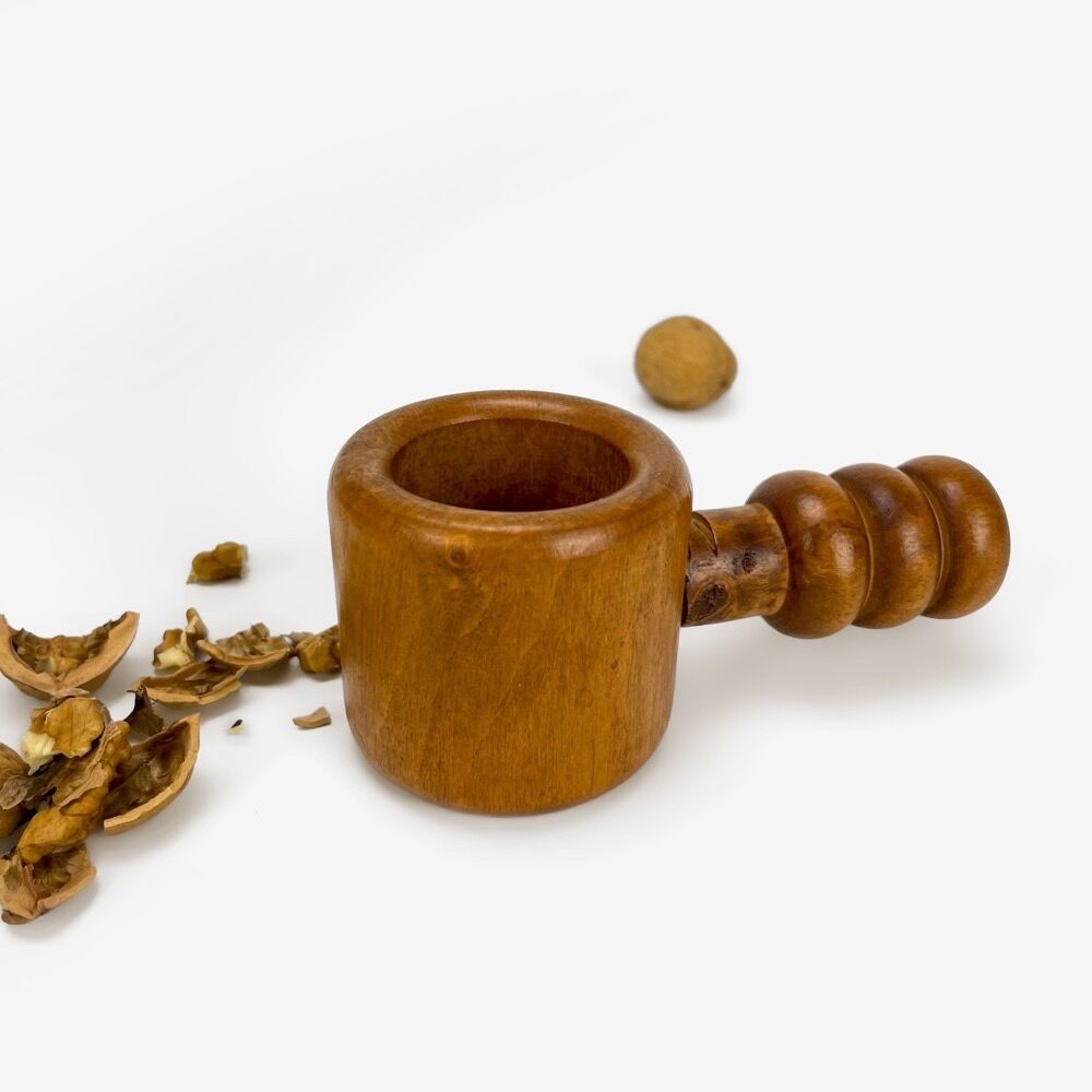 Old nutcracker with turned wooden screws