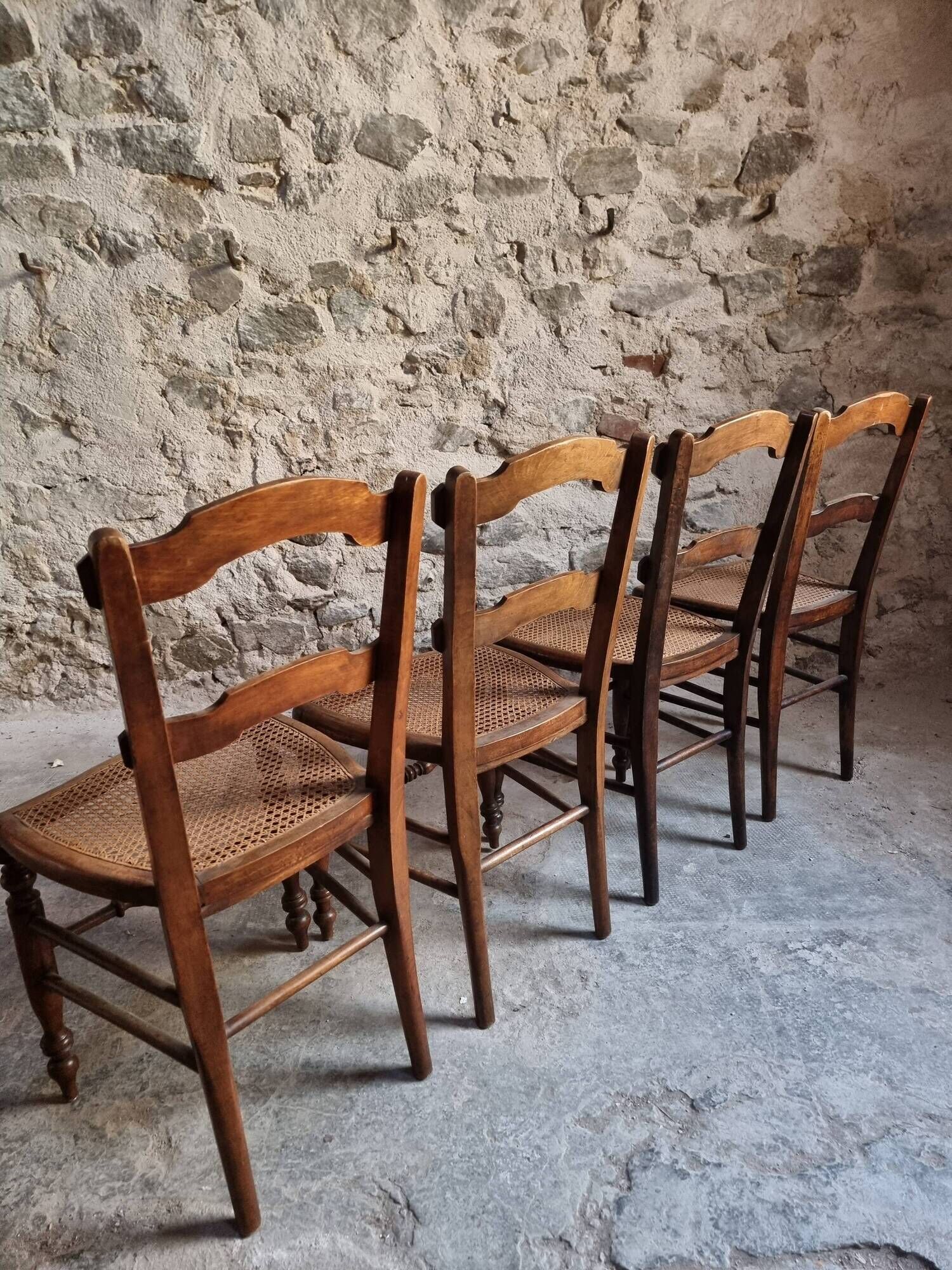 Set of 4 antique dining chairs with caned seats, beech, France, circa 1900–1920.
