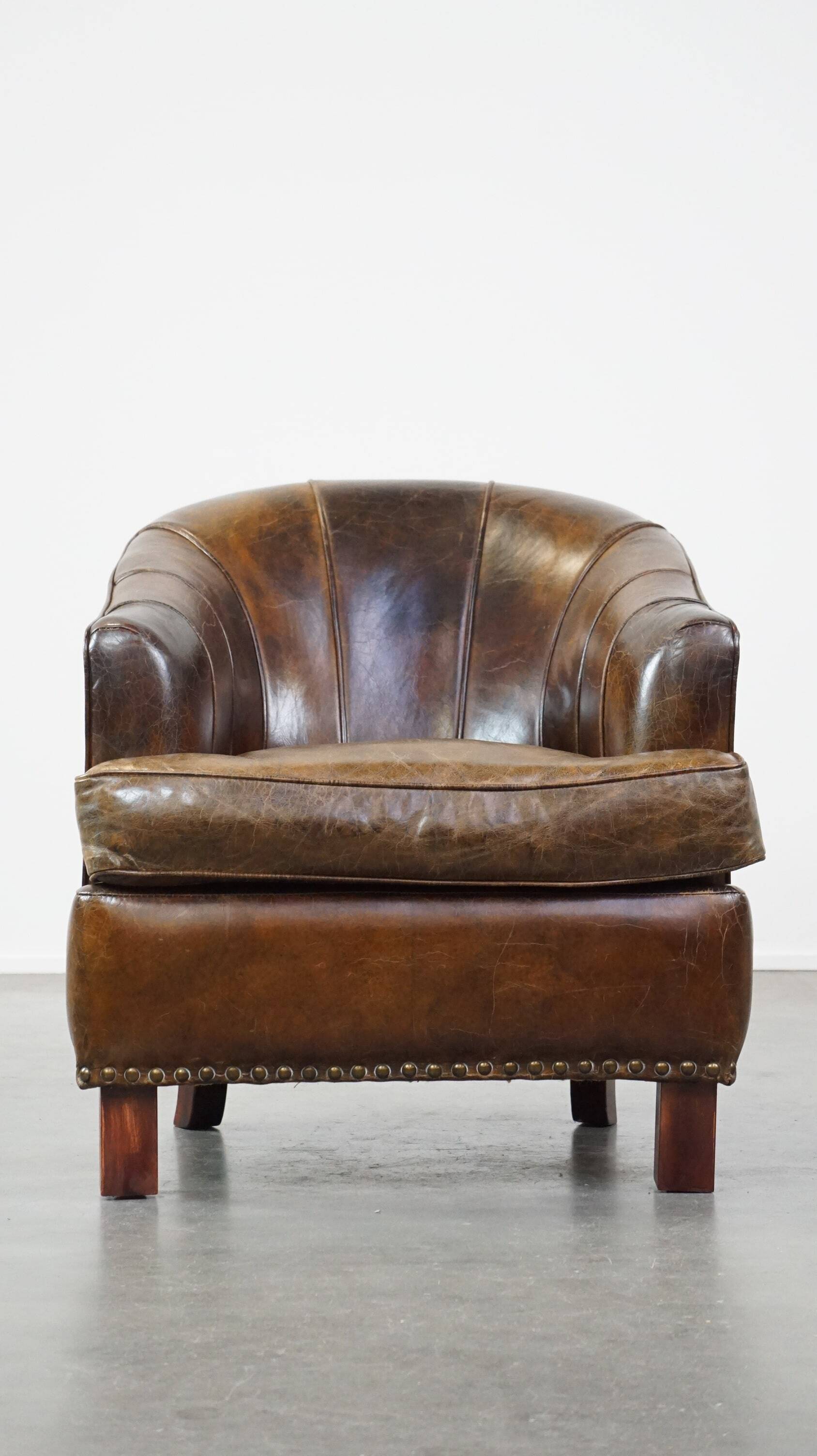 Stylish armchair with a unique design and beautiful finish, made of leather