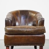 Stylish armchair with a unique design and beautiful finish, made of leather