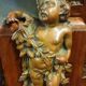 Empire style half-moon shaped mahogany bookcase with putti