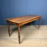 Antique cherry wood dining table from France.