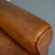 Vintage french moustache back cognac-colored leather club chair