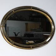 Miroir ovale à parclose en laiton, style hollywood regency – 1970